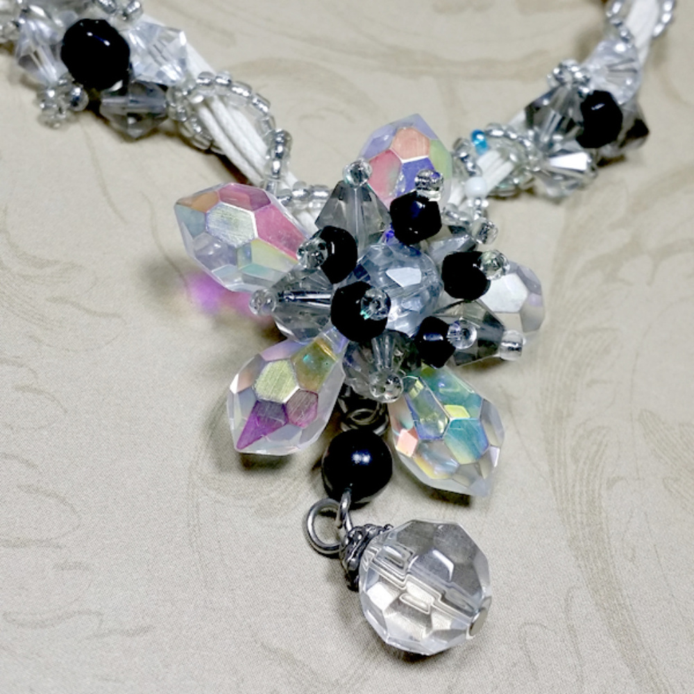 White with black/clear design necklace